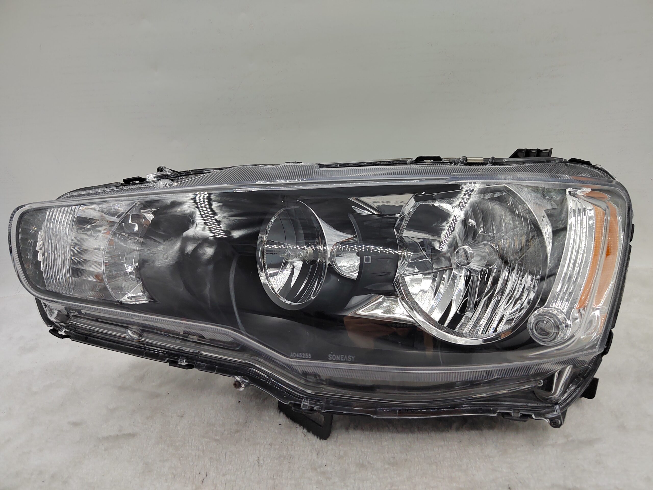 MITSUBISHI LANCER 2008-2018 HALOGEN L.H.S HEADLIGHT ASSEMBLY